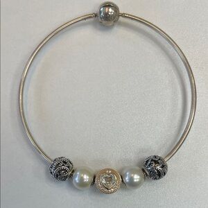 Pandora Essence bracelet with silver and gold plated heart charm